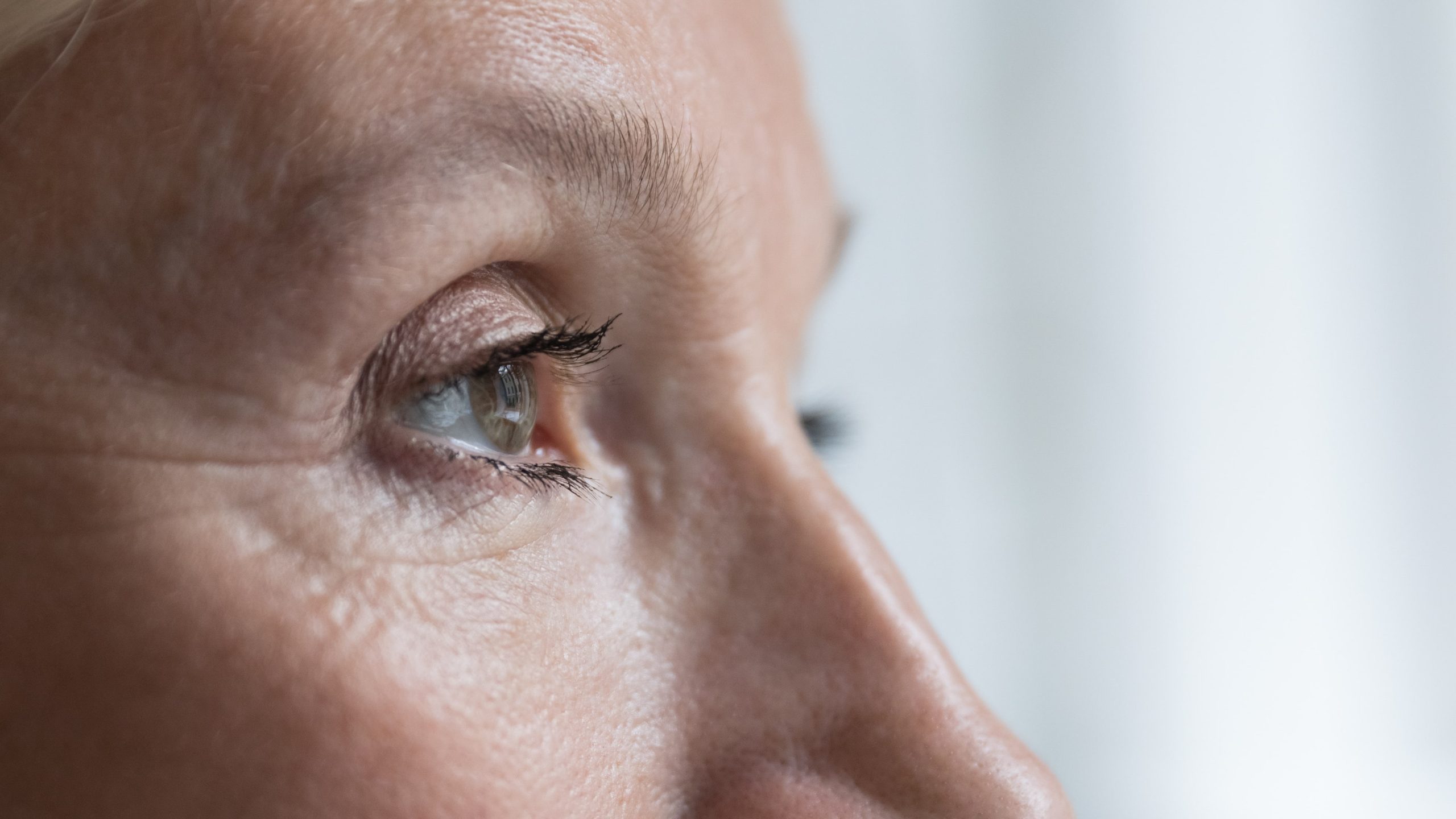 Close-up of older woman's eyes before retinal treatment to preserve vision